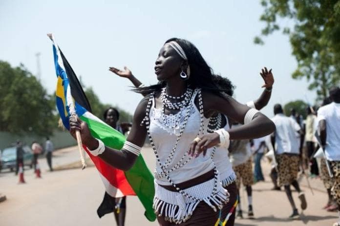 sudao-mulher-bandeira-reuters