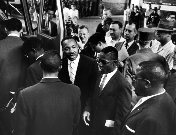 Rev. Martin Luther King Jr. (C, L) with Freedom Riders boarding bus for Jackson, MS..
