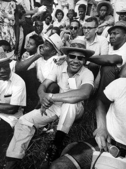 Civil rights leader Dr. Martin Luther King Jr. sitting with demonstrators who walked through Mississippi to encourage voter registration. (Photo by Vernon Merritt III/The LIFE Images Collection/Getty Images)