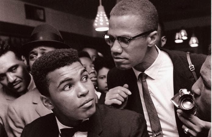 Malcolm-X-kidding-around-with-Muhammad-Ali-New-York-1963