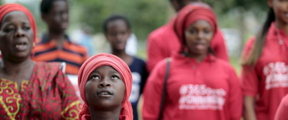 A Bring Back Our Girls (BBOG) campaigner looks on during a protest procession marking the 500th day since the abduction of girls in Chibok, along a road in Abuja August 27, 2015. The Islamist militant group Boko Haram kidnapped some 270 girls and women from a school in Chibok a year ago. More than 50 eventually escaped, but at least 200 remain in captivity, along with scores of other girls kidnapped before the Chibok girls. REUTERS/Afolabi Sotunde