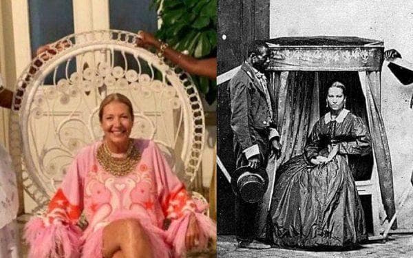 Donata Meirelles, diretora da revista Vogue, evoca e faz reviver as “cadeirinhas de carregar” do século XIX, com dois escravos ao lado de uma figura branca ao centro