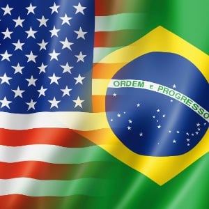 Ilustração da bandeira do  Brasil ao lado da bandeira dos EUA
