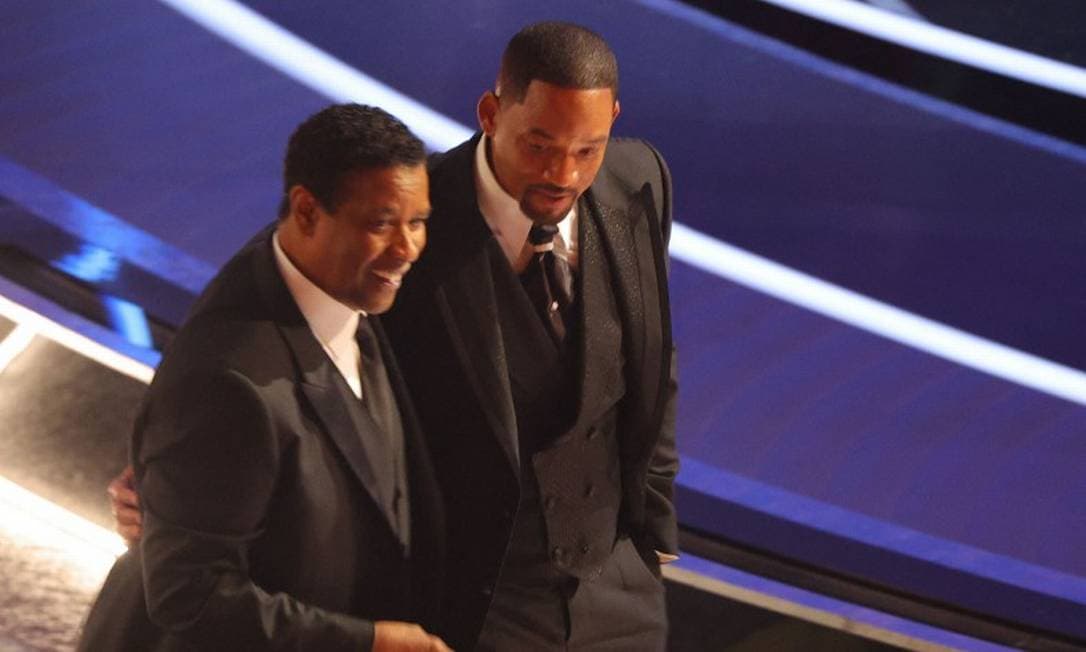 Denzel Washington fala pela primeira vez sobre tapa de Will Smith em Chris Rock no Oscar: ‘Quem somos nós para condenar?’